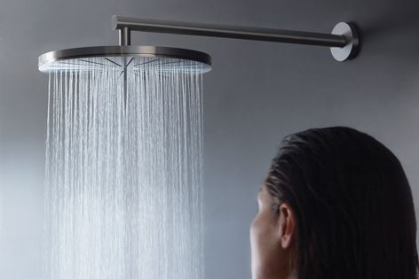 The round-head shower from VOLA conserves water, delivering as little as 15 litres of water per minute at three-bar pressure.