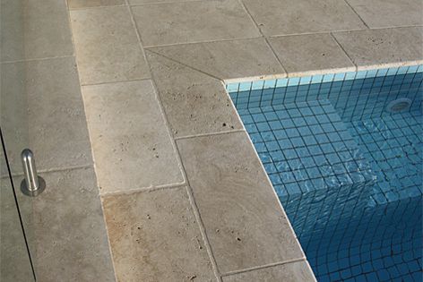 Resilient and easy to maintain - travertine paving in a provincial cream blend, sourced from Turkey.