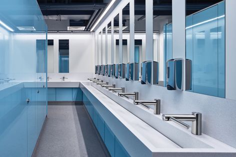 The Corian washplane design and Dyson AirBlade Tap eliminate the need for paper towel waste, providing a lower operating cost.