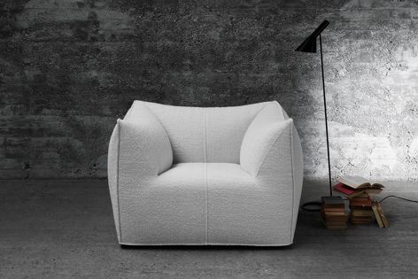 The Le Bambole by Mario Bellini range includes an armchair, a two-seater sofa, a three-seater sofa and a double bed.