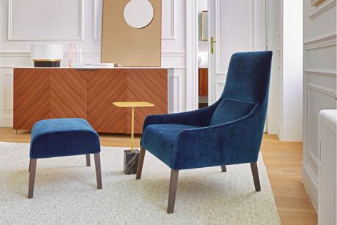 Available from Domo, the Ligne Roset Long Island armchair and footstool bring together comfort, elegance and a choice of colours.