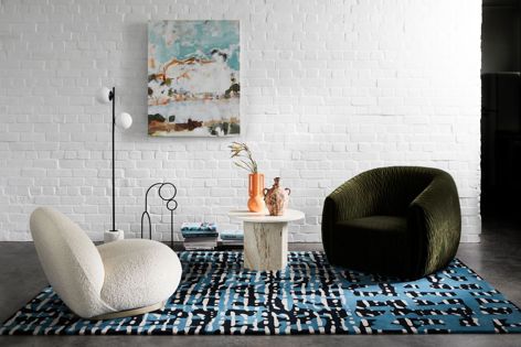 The Evie rug by Chloe Boudib measures 200 cm × 300 cm and is hand-tufted from bamboo and New Zealand wool.