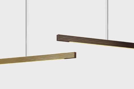 Capital by Archier is available in 1,800 mm or 2,400 mm sizes, featuring a sleek brass profile with American Walnut timber detailing.