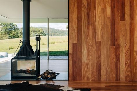 ArmourFloor spotted gum wall cladding and floorboards help to connect this dwelling, which was designed by Room 11 Architects, with its surrounding landscape on the rugged Tasman Peninsula.